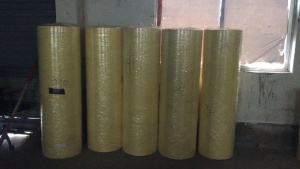 长期大量求购卷筒黄色单面涂硅淋膜纸，80克左右