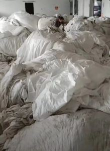 长期出售白色涤纶废布，化纤布，锦纶废布等