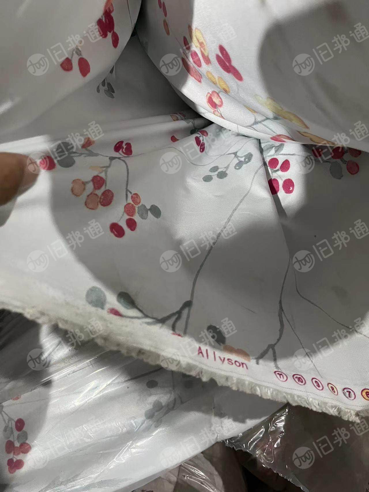 出售人棉库存印花卷布几十吨!