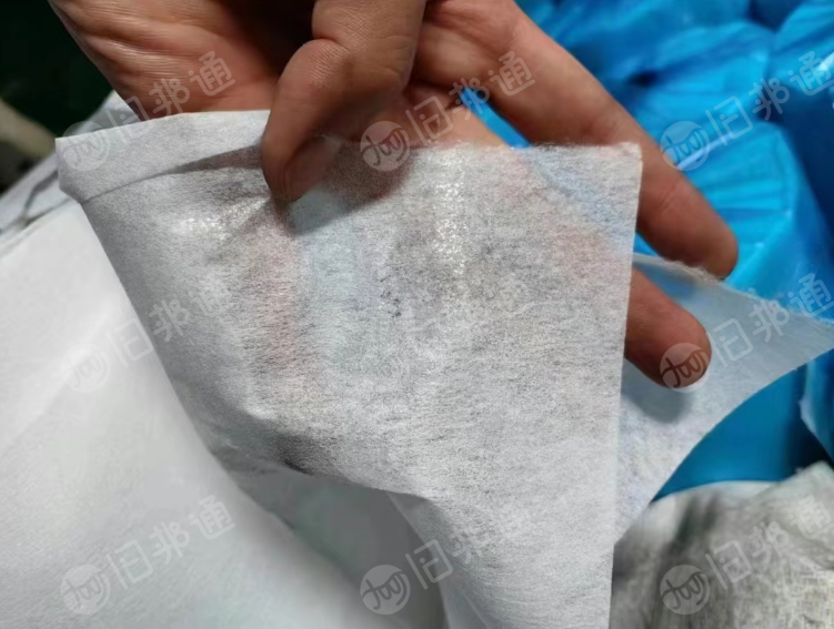 出售全涤无纺布几十吨一等品,有的带点胶有的不带!