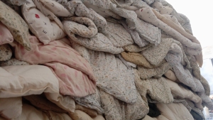 旧衣服回收统货，有的老板联系我，大量回收，月需50吨