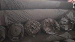 库存拉磨布卷子布低价处理一批