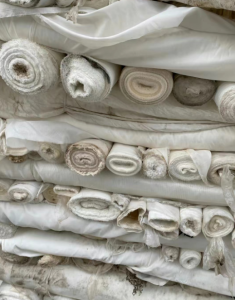 大量收购涤纶废料，过滤布，防尘袋废丝废布一切涤纶废料