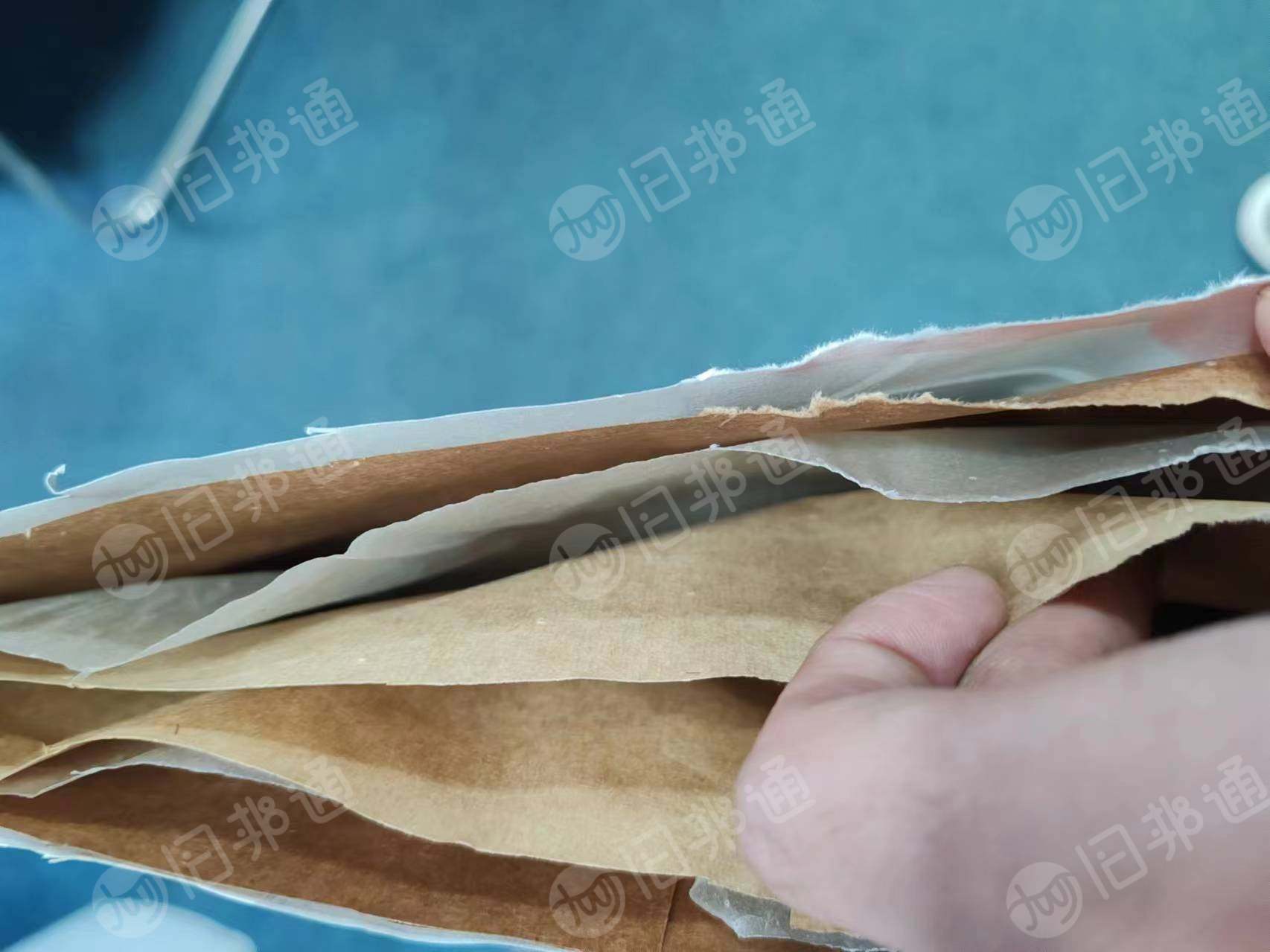 出售库存牛皮纸袋,三纸一膜有2万多条,纸塑袋1万多条