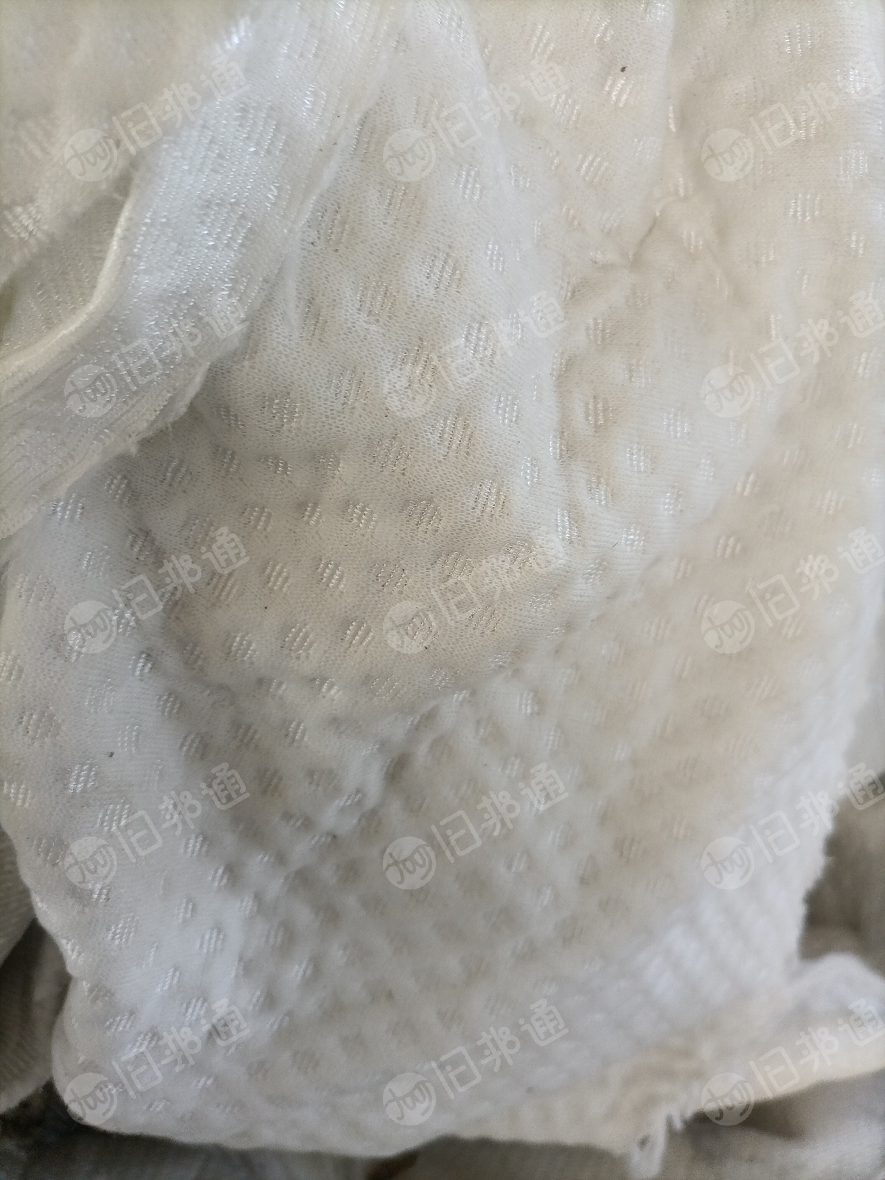 长期收购氨纶,弹丝,毛衣片,化纤等白色开花原材料