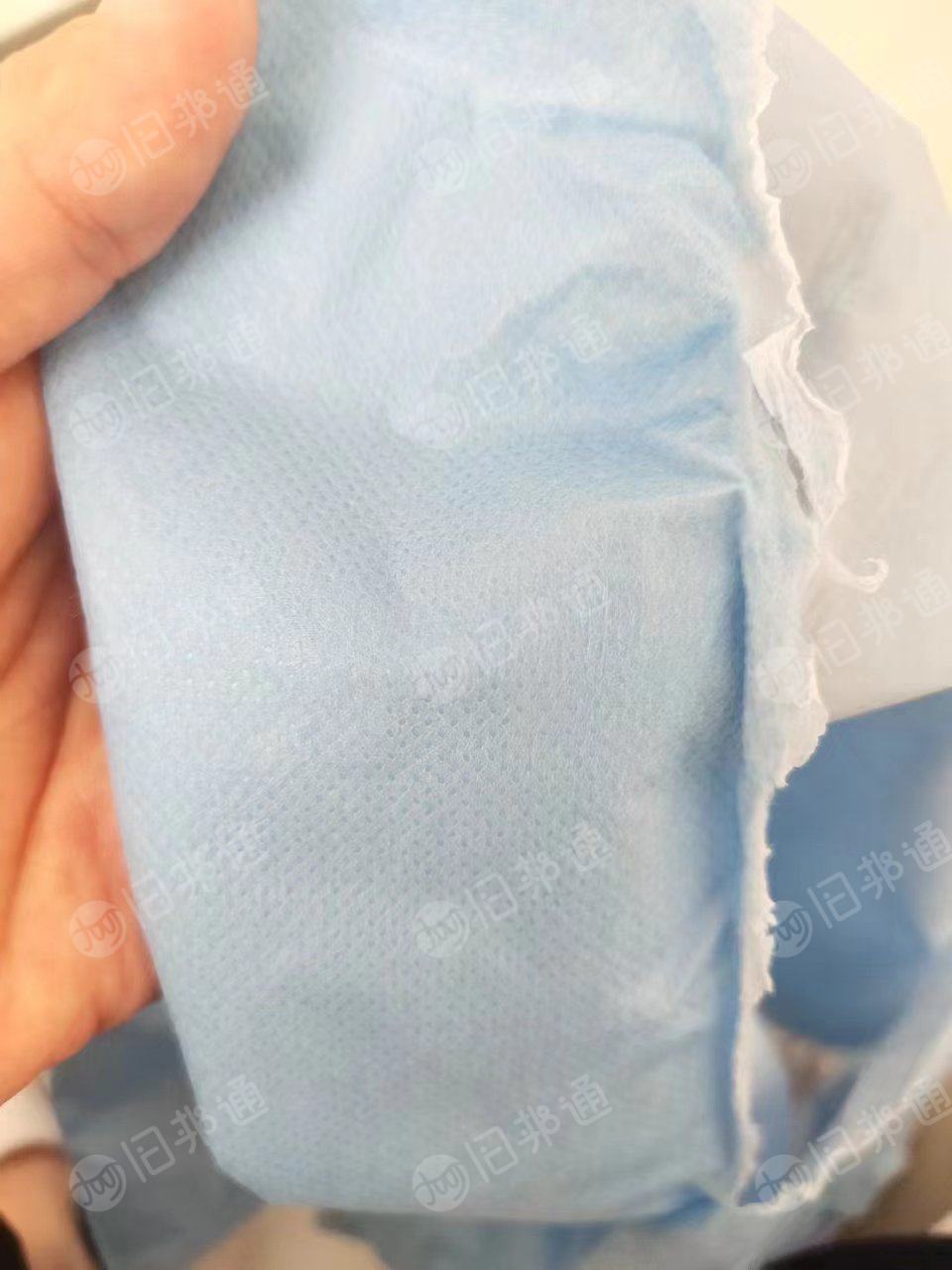 出售蓝色无纺布边料,pp复pe无纺布边料,现货5吨左右