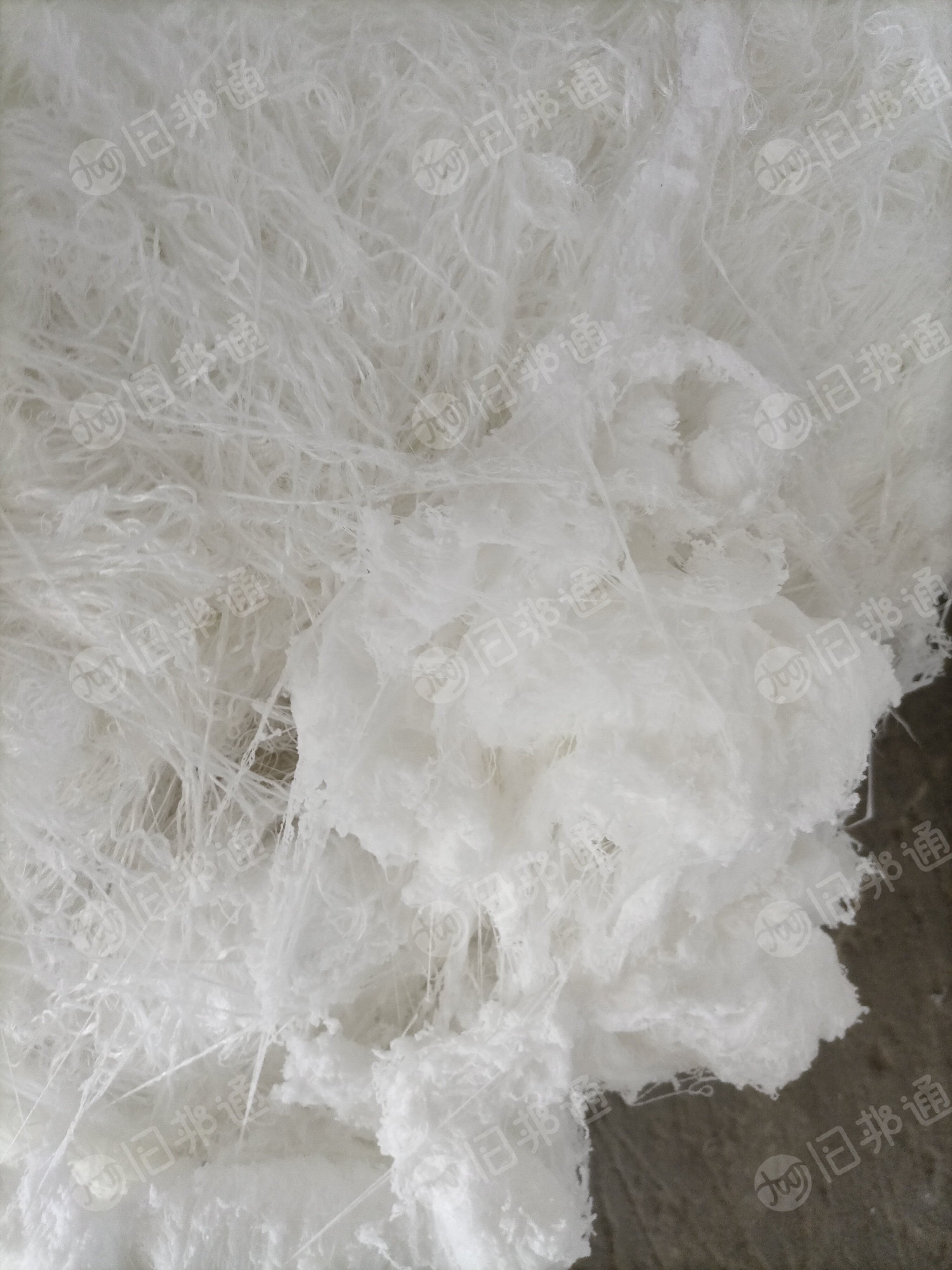 长期回收各种白色开花料,氨纶,涤纶,毛衣片,废布等