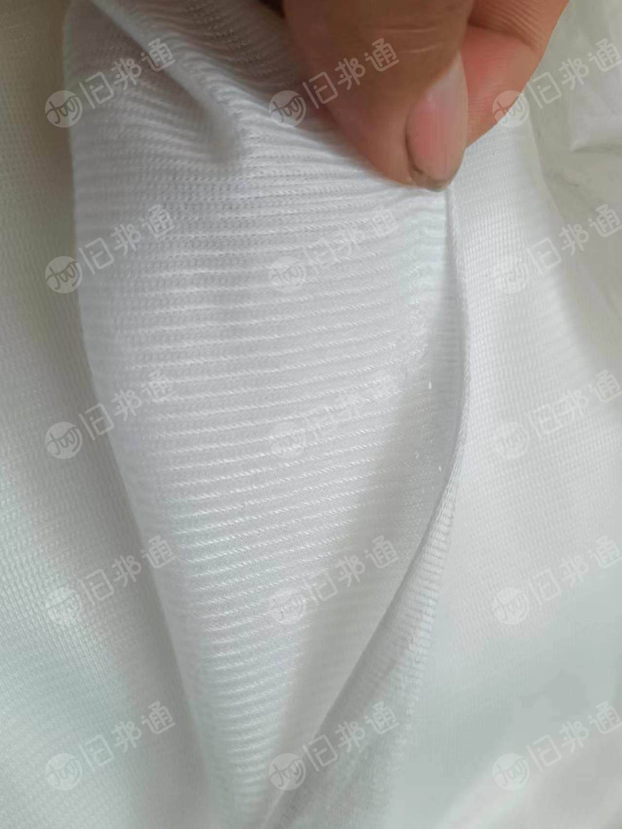 长期出售白色涤纶针织精棉布,涤纶废布,月供六七十吨,货在浙江嘉兴桐乡