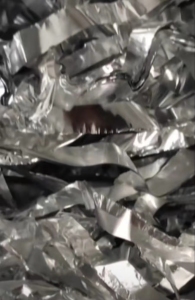 出售包电缆下来的PET铝塑膜，含铝40%左右