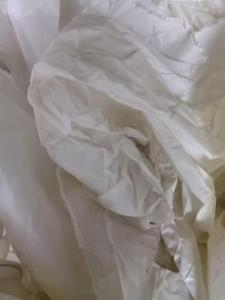 出售白色的尼龙废布，纯尼龙布块，尼龙边角料，现货4吨左右