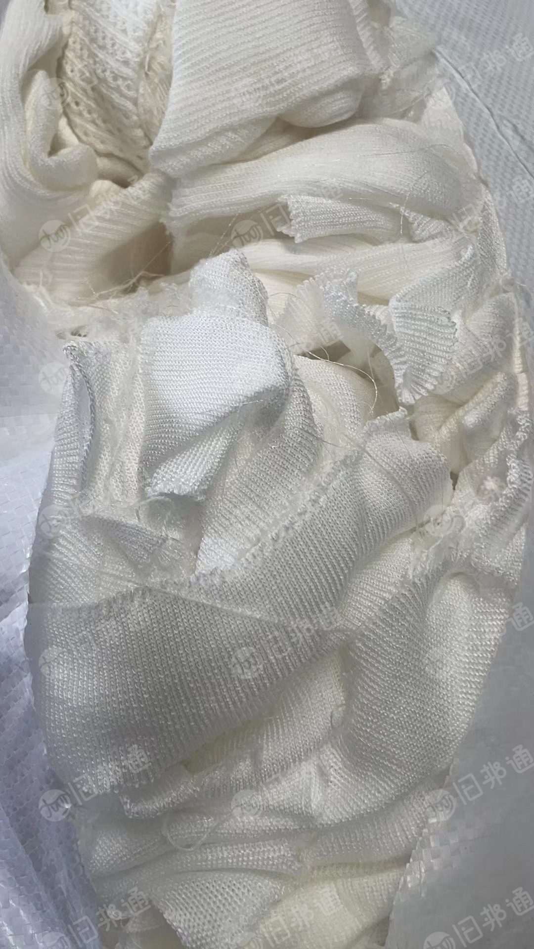 长期出售白色毛衣片,毛衣下脚料,开花料,货在广东佛山