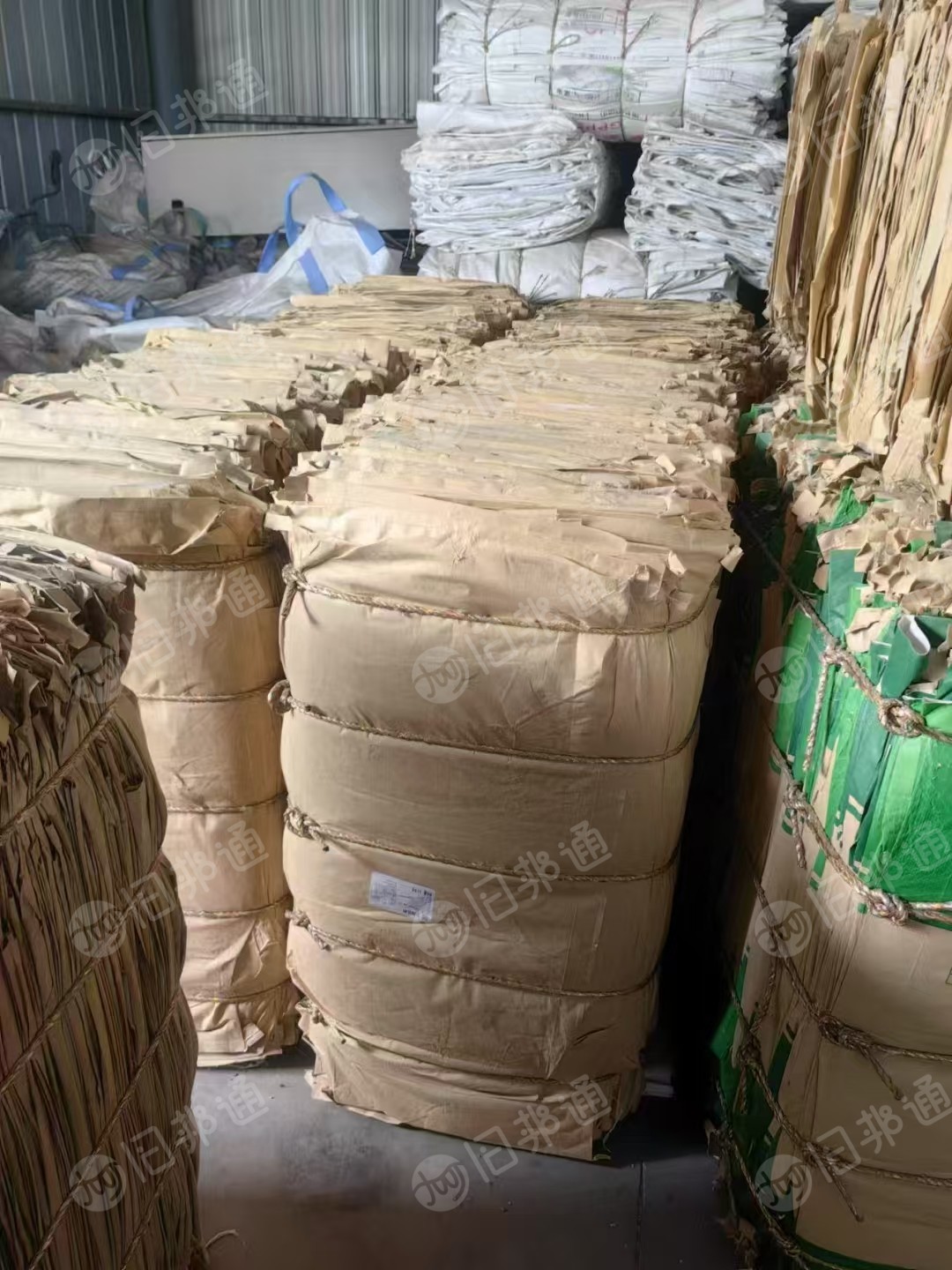 出售两款二手清一色奶粉纸塑袋,数量两万五条,1000条一个包