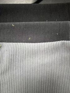 出售化纤灯芯绒,灯芯绒库存布,160门幅,有灰绿,军绿,黑色,货在江苏盛泽
