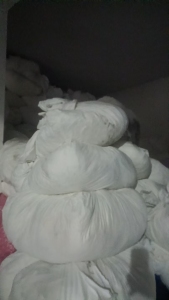 长期出售涤氨废布，涤氨边角料，涤氨开花料，现货十几吨