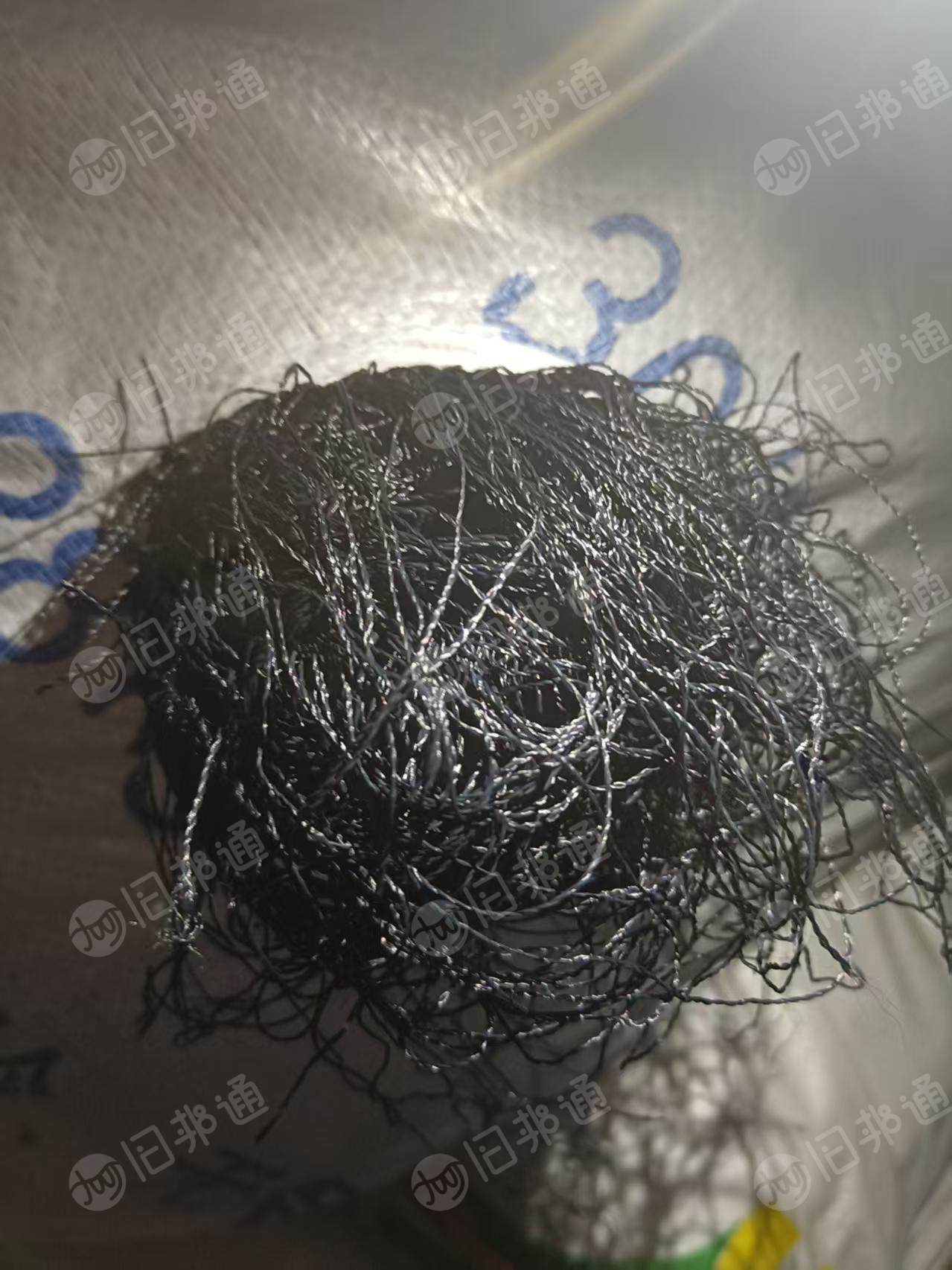 长期出售纺织厂下来的加过撵度的人造丝，废丝，现货十五六吨