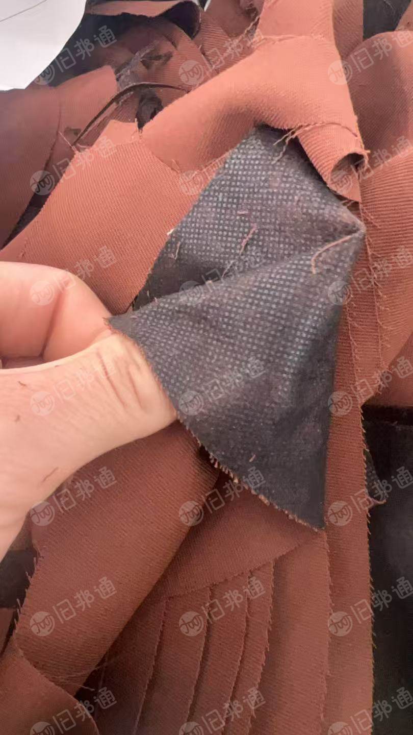 长期出售尼龙废布,尼龙里布,带一层衬纸,日供80-90吨