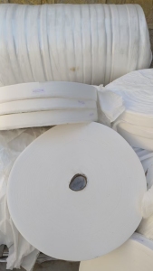 长期回收白色涤纶无纺布布条，无纺布盘料，厂在山东滨州