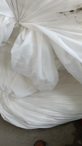 长期出售白色的纯尼龙废布，尼龙边角料，尼龙丝