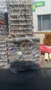 出售挑拣出来的PET吸塑盒压块，含PVC，带标签，现货十几吨