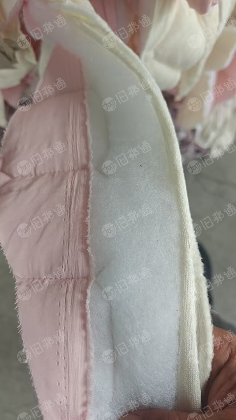 长期出售夹丝棉下脚料，做童装下来的，压包好的，现货60吨左右