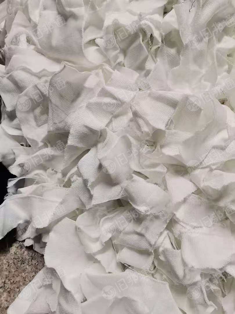 长期出售白色的涤纶毛衣片，毛衣片下脚料，现货一柜