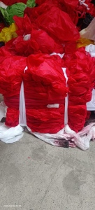 长期出售带桨的涤纶废布，涤纶开花料，现货十几吨