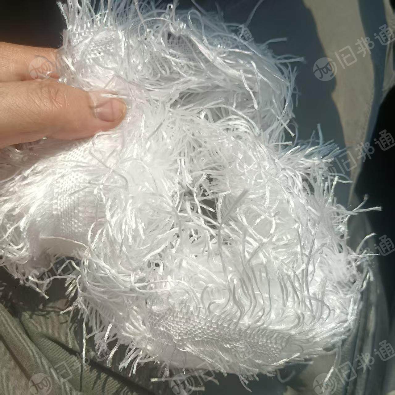 长期出售尼龙布边纱锦纶布边纱,织布厂下来的,单6,每个月80吨,货在广东清远