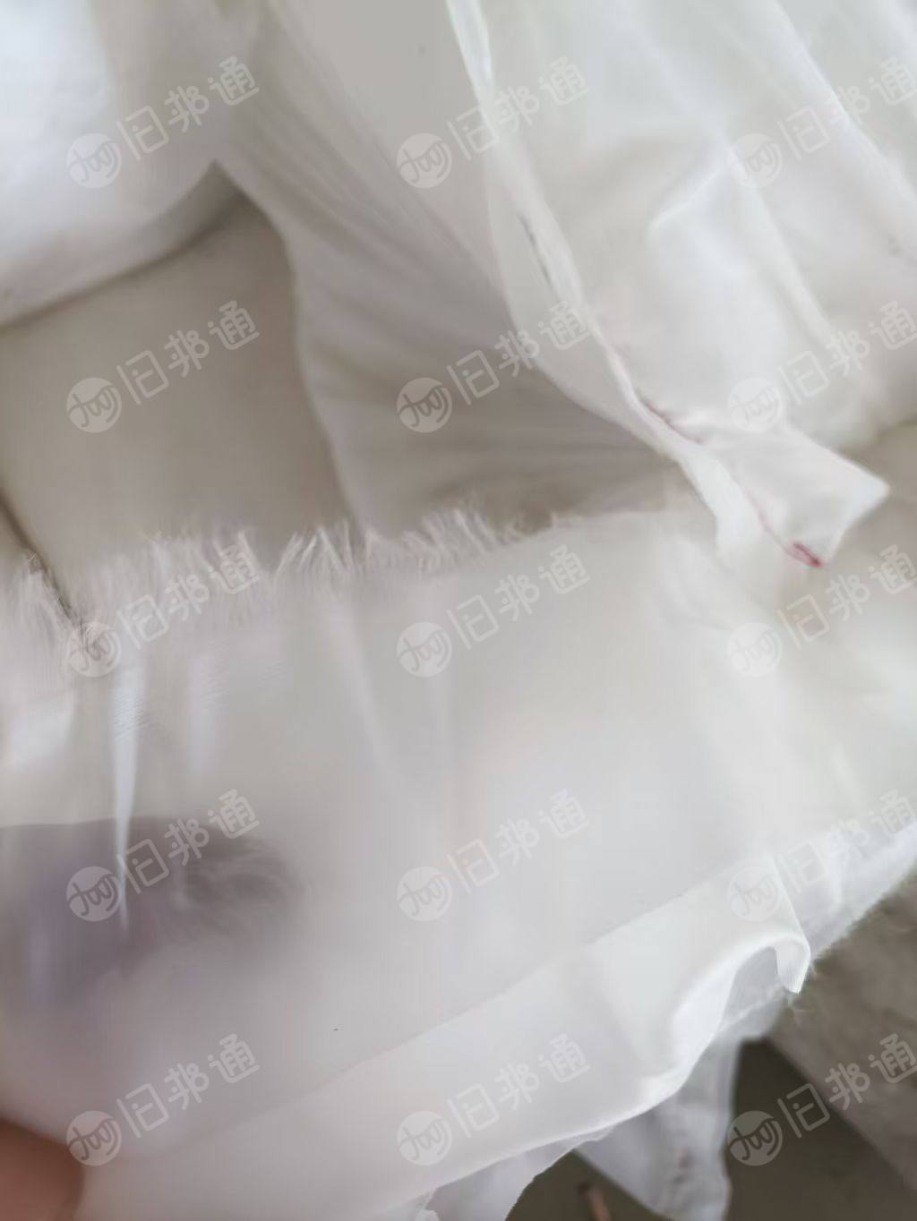 长期出售白色涤锦布条，锦纶含量50左右，现货有6吨左右，可开花可造粒，货在浙江湖州