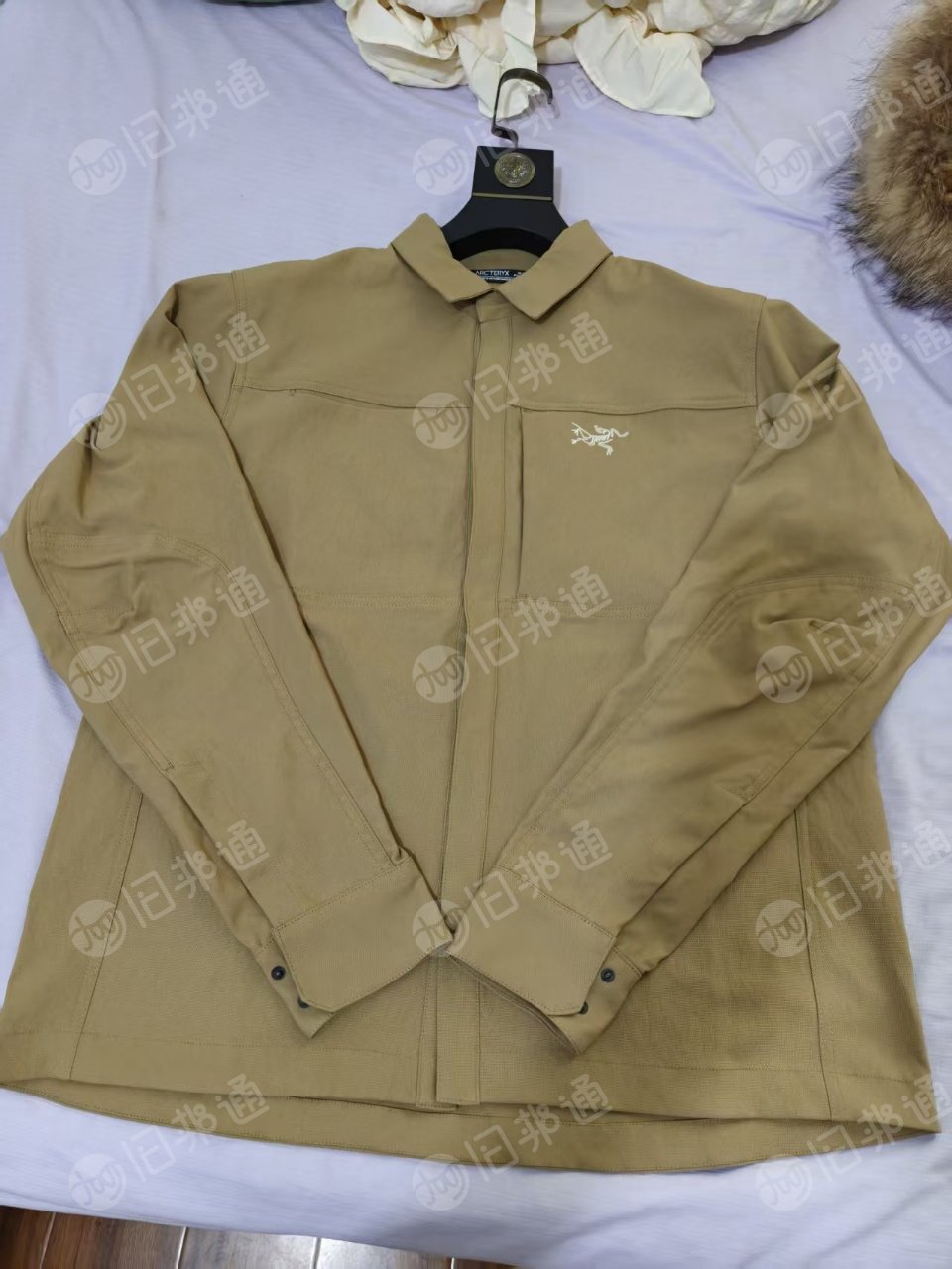 现货低价处理一批库存服装，始祖鸟品牌的，款号SZN001，始祖鸟男子长袖衬衣，现货1300件