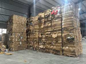 长期出售黄板纸压包料，大量货源