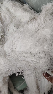 长期出售染厂下来的涤纶包覆纱，氨纶包覆纱，不含水，月供二十多吨