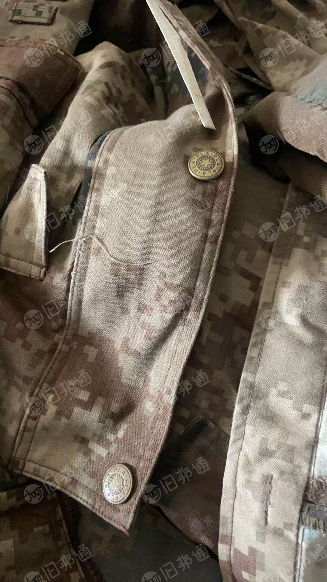 出售部队退下来的迷彩服服装，涤纶材质，现货有一万多吨，货在山东滨州