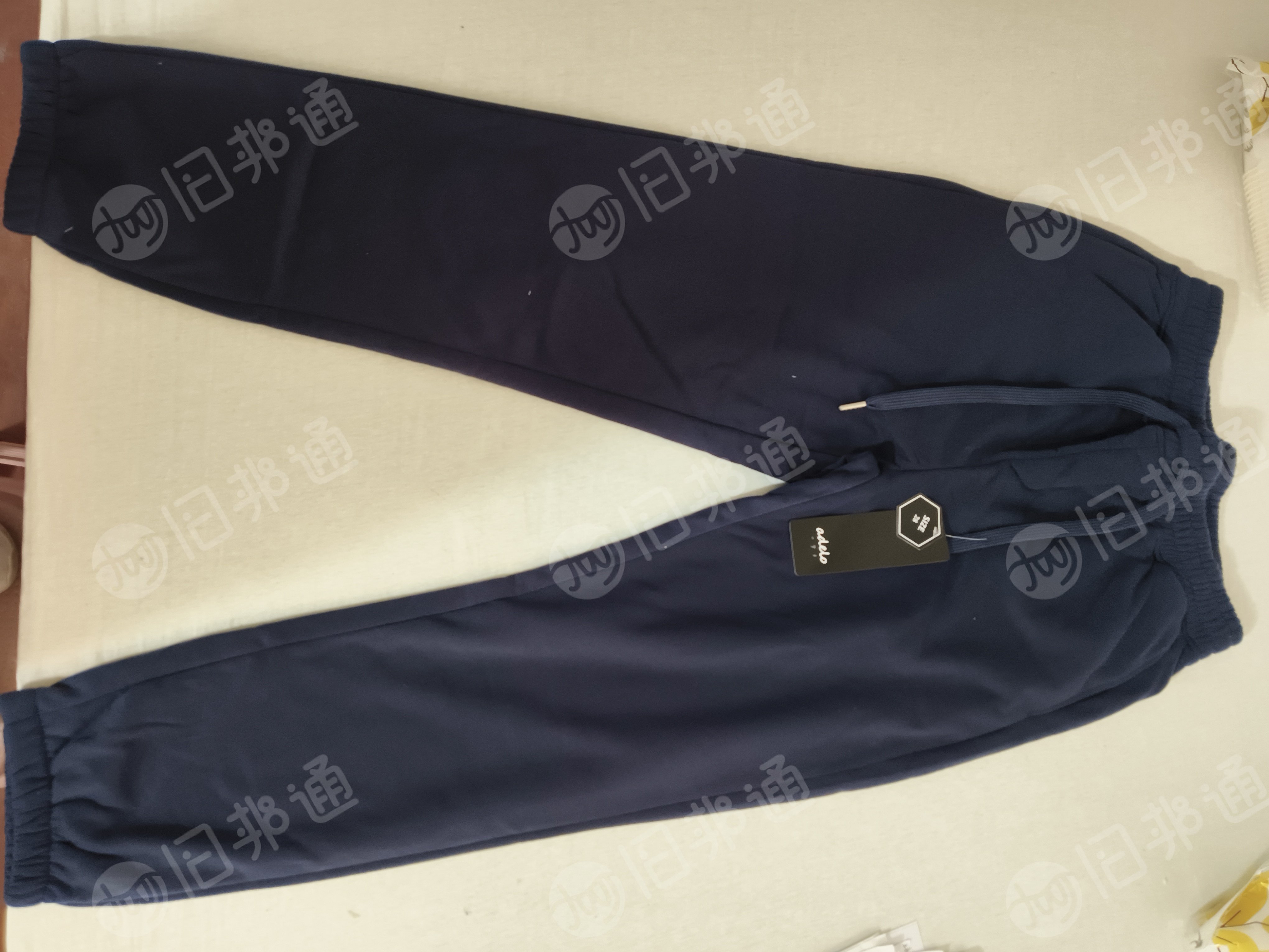 现货处理一批工厂倒闭退下来的裤子,整单男款女款6个颜色,现货2万多条,货在河南漯河