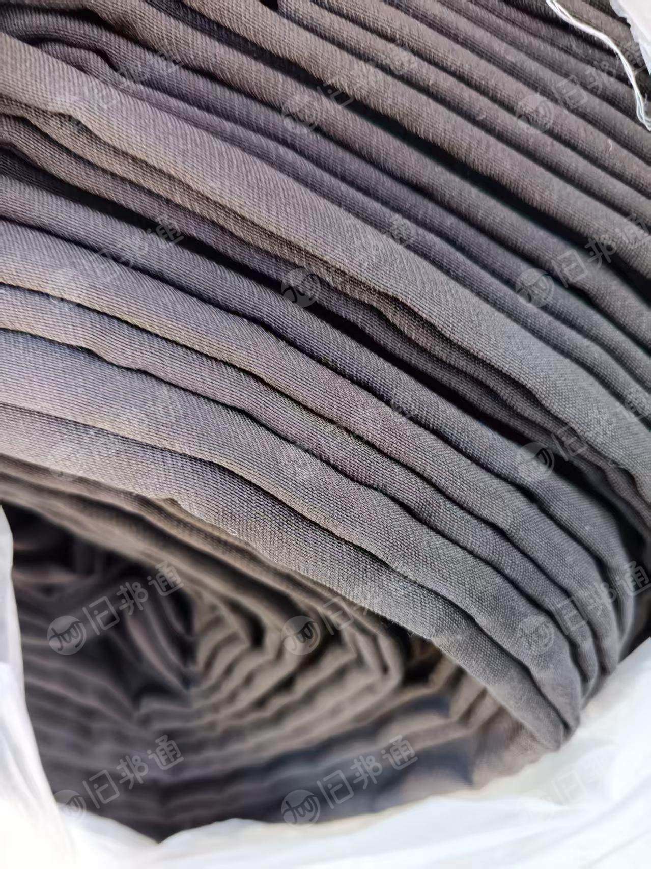 长期出售针织布，梭织布，库存布，库存面料，有白坯布，也有印花布