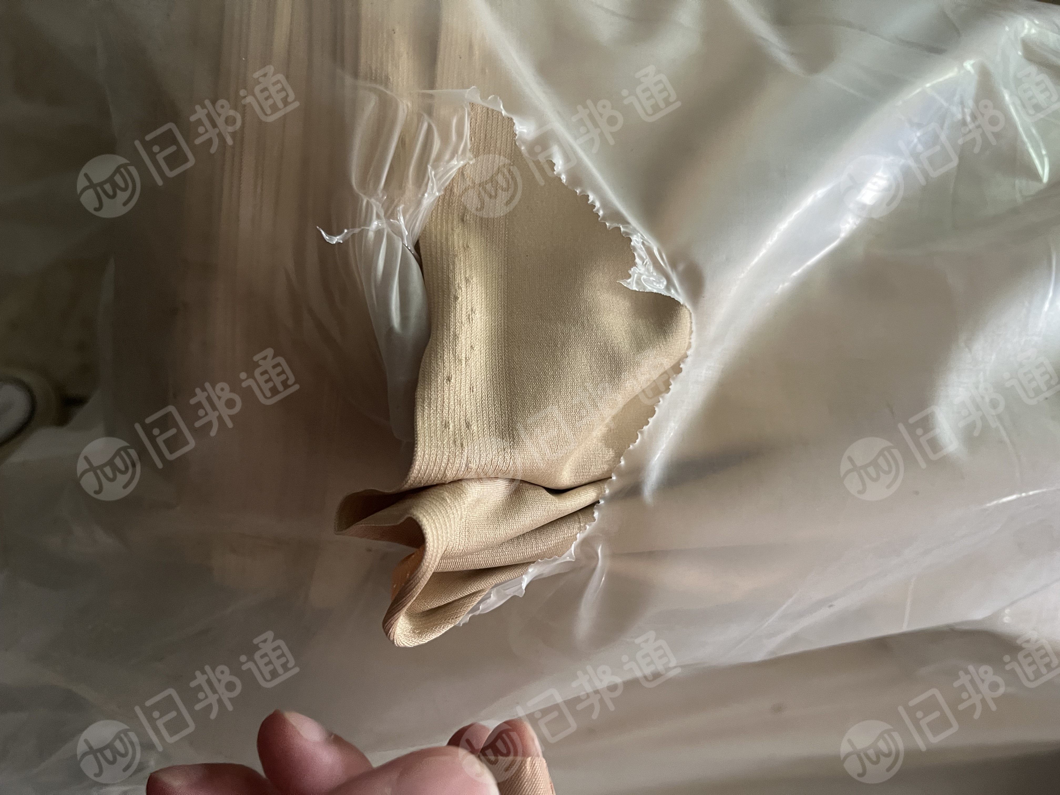 出售一批库存经编涤纶布