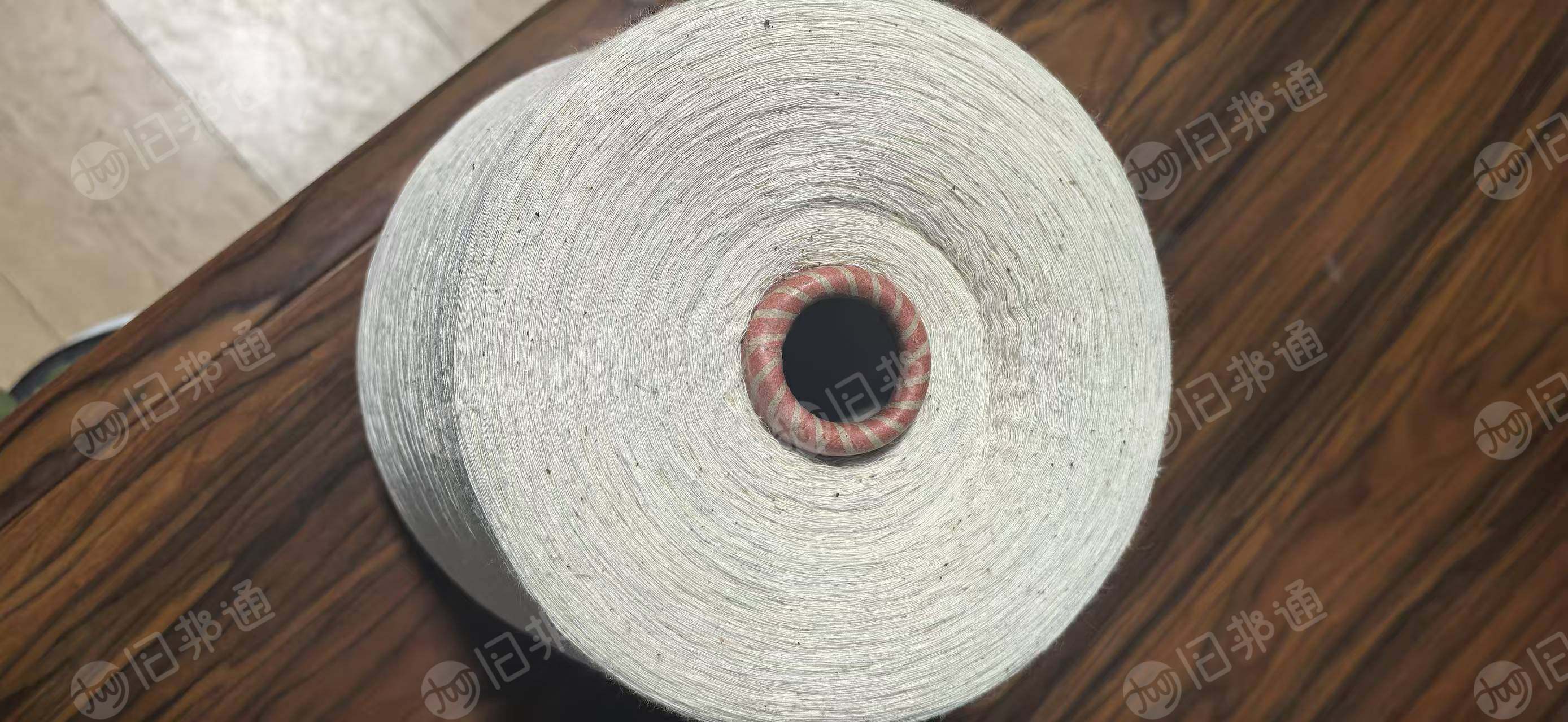 低价出售环锭纺纯棉棉纱，21支强力300左右，可漂可染，现货90吨，中间商勿扰