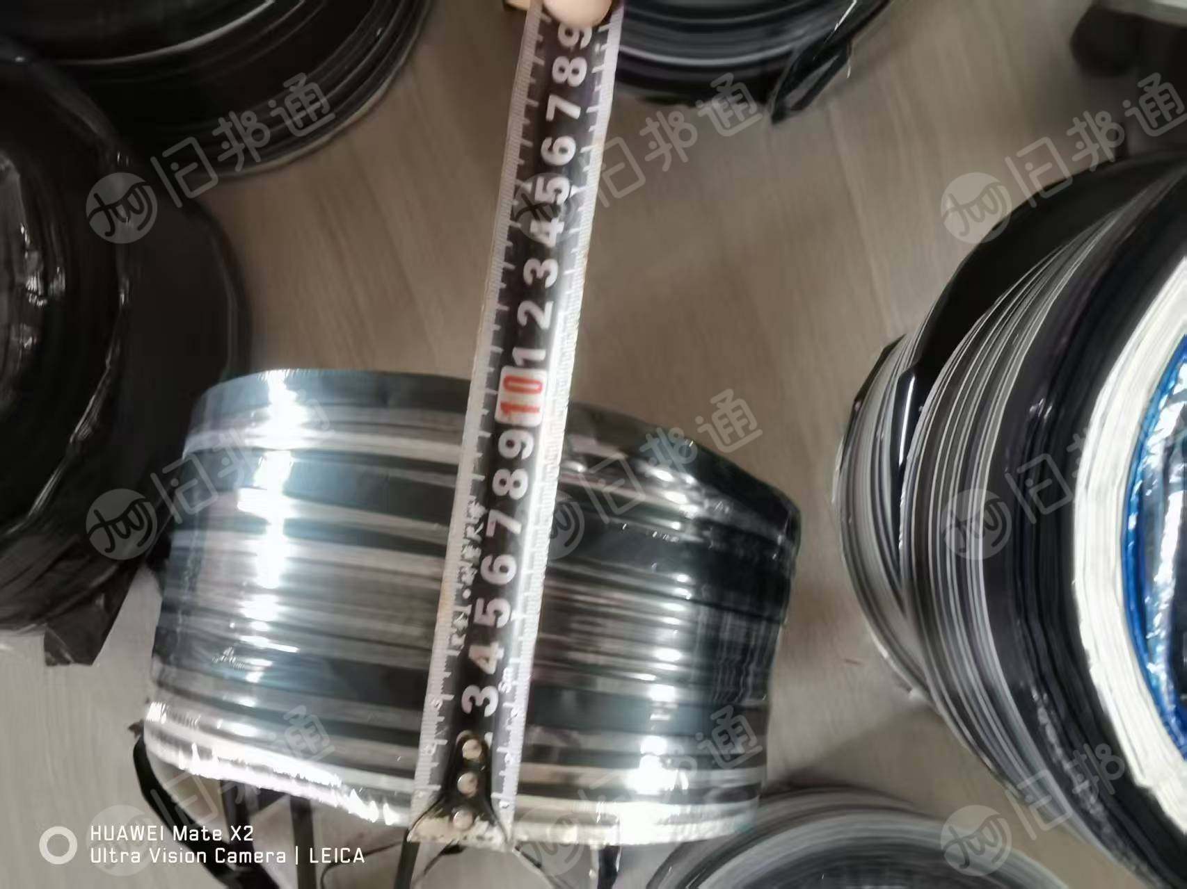 出售pet印刷膜下来的边角料，全部都是卷的，厚度0.9，可以打绳用