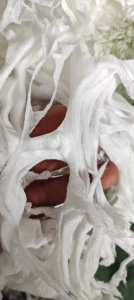 长期出售手套厂下来的涤棉无纺布，涤棉无纺布边角料，涤纶含量高，现货60多吨