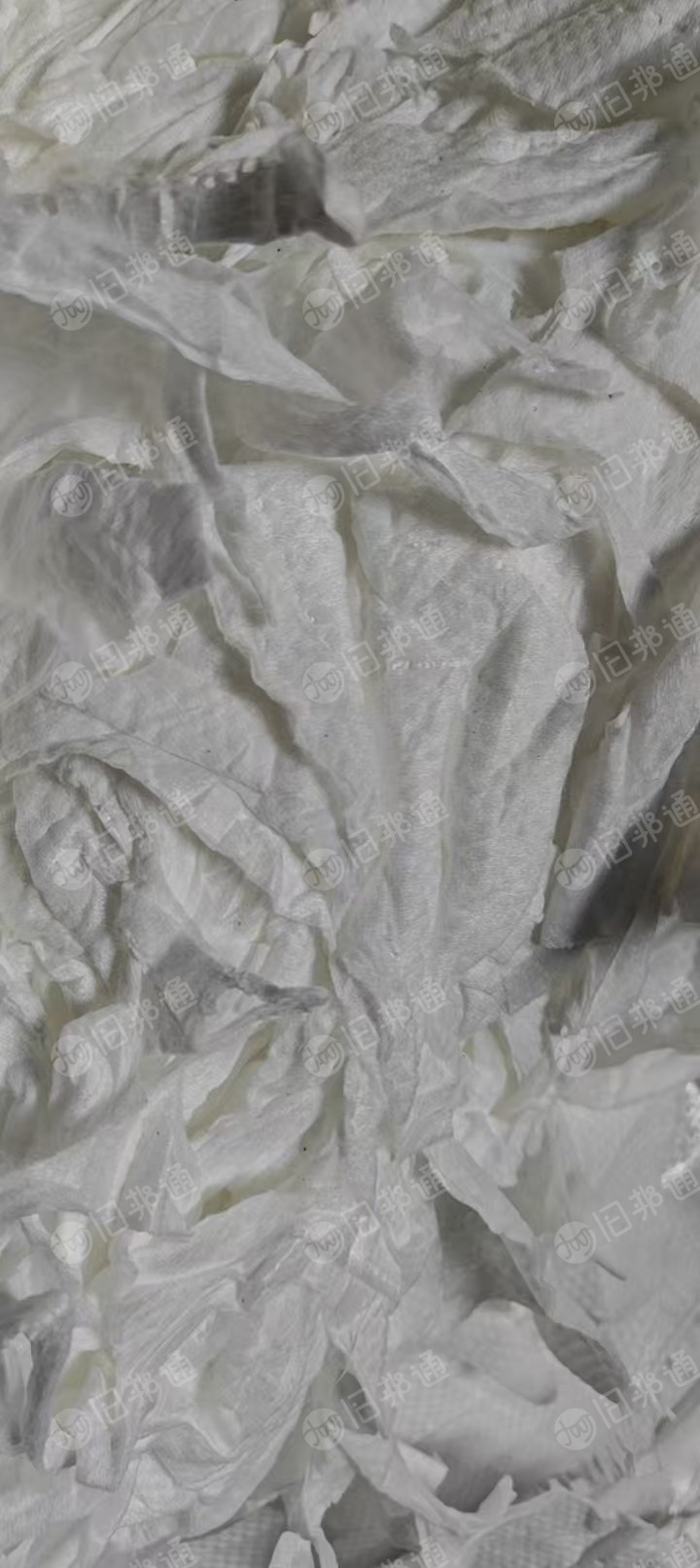 长期出售手套厂下来的涤棉无纺布，涤棉无纺布边角料，涤纶含量高，现货60多吨