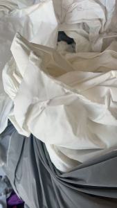 长期出售白色的纯尼龙废布，尼龙边角料，尼龙生坯布，现货三四吨