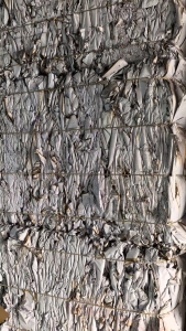 出售白色淋膜原纸压包料，不带膜，有一点火烧痕迹