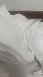 长期出售白的尼龙废布，锦纶废布，月供十几吨，货在山东青岛