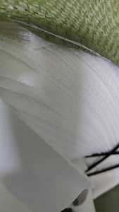 长期出售飞织鞋材废布，涤纶废布，网眼布，月供一百多吨