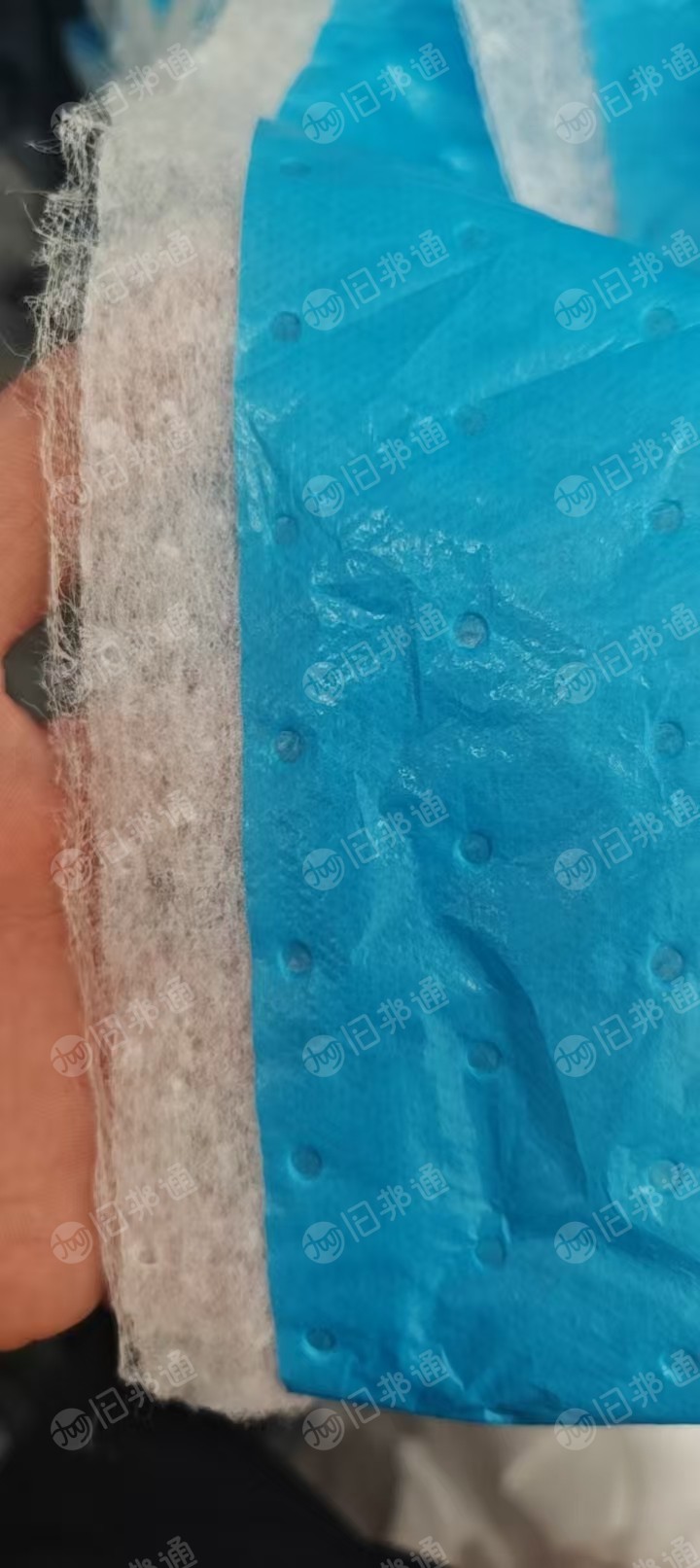 长期出售三层复合无纺布，pp+pet+pe，现货一百吨，货在广东佛山