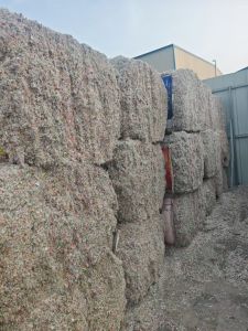 长期出售透明丙风选下来的商标纸废料，PP/PVC一半一半，含点聚酯