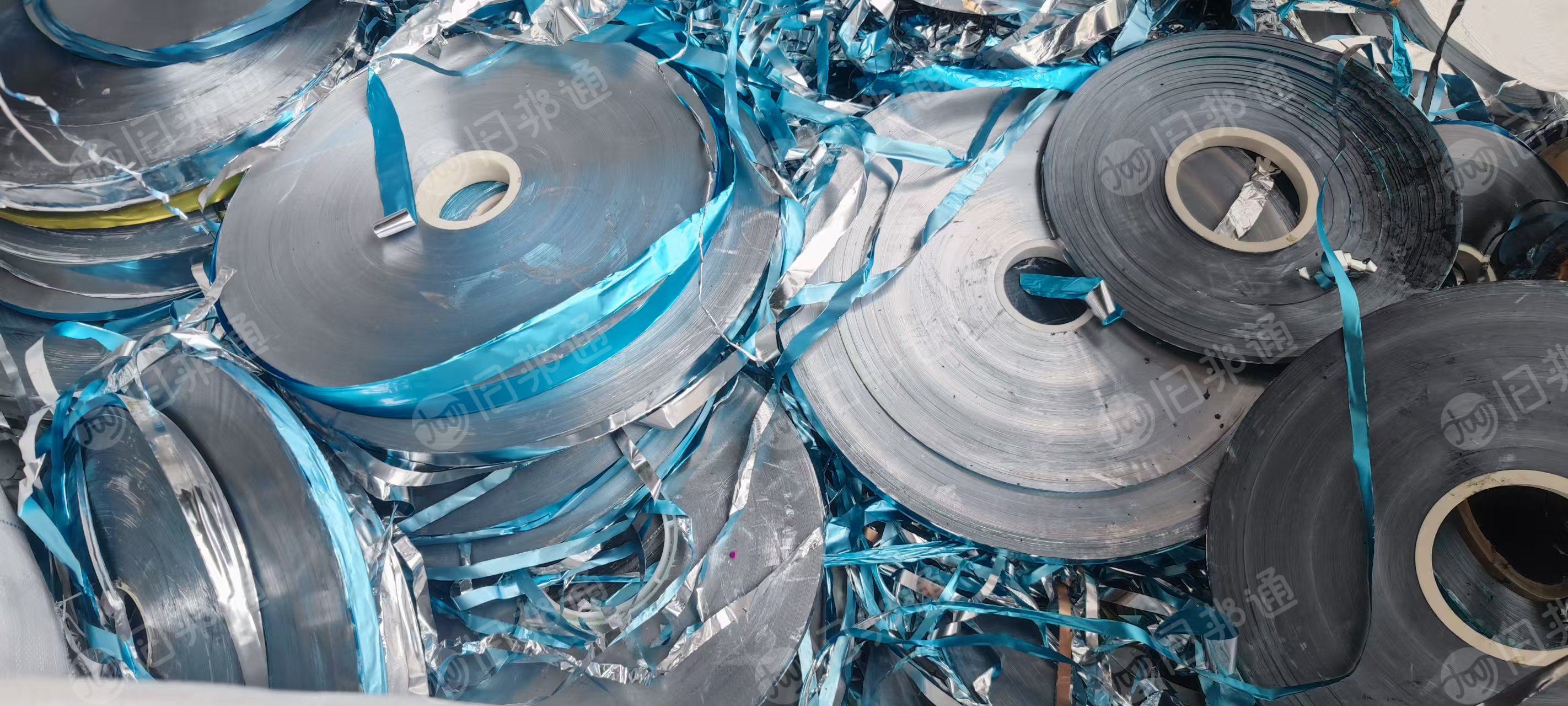 长期出售包电缆下来的铝塑膜，空调铝箔，单面含铝38-40，双面60以上