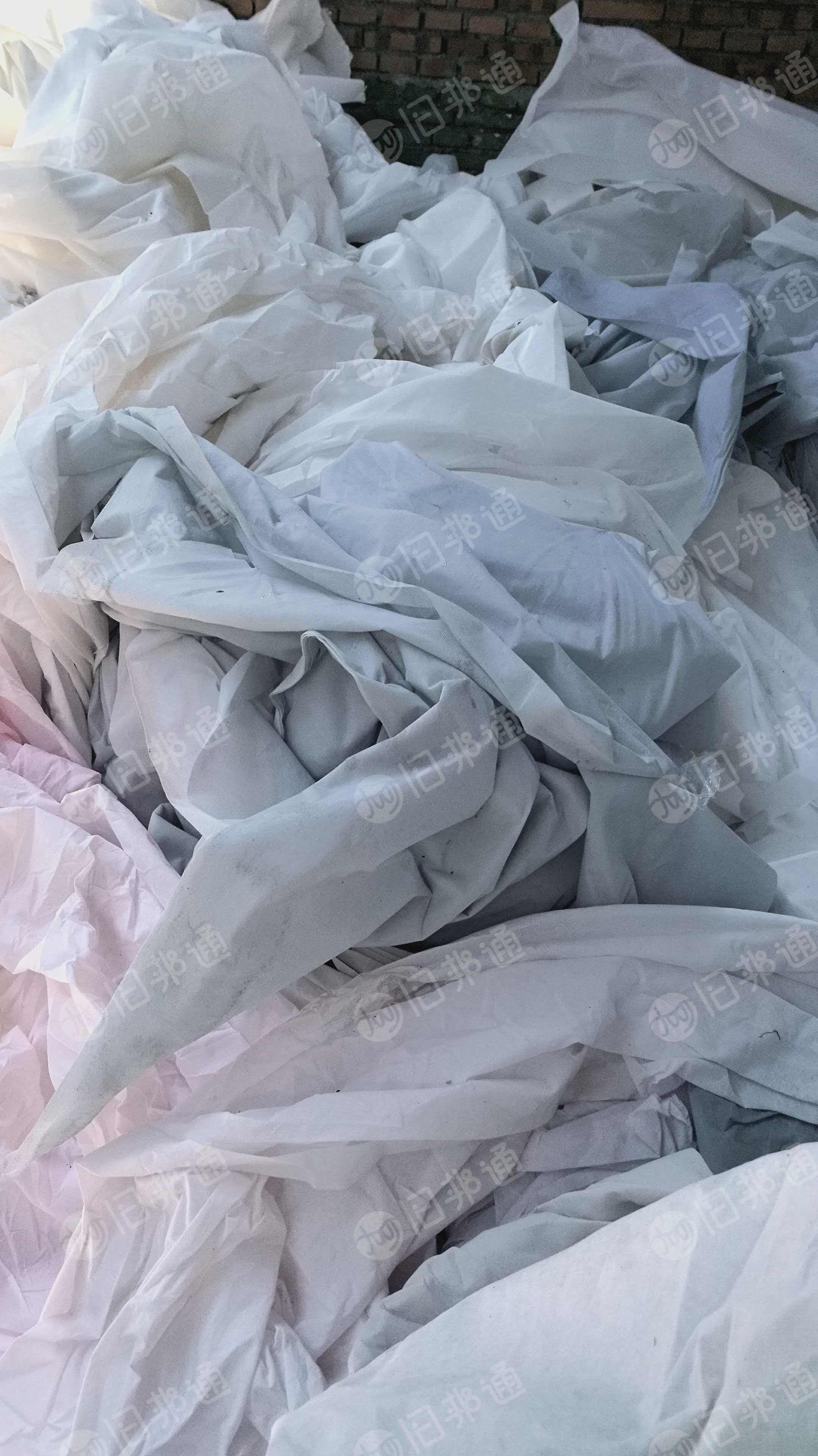 长期出售制衣厂下来的白烟废布，锦纶废布，氨纶废布，涤纶废布，无纺布，开花料，月供200吨