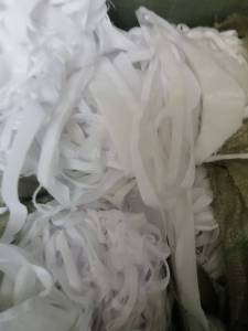 长期出售做被子下来的白色废布，夹丝绵开花料，月供20吨