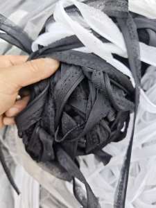 长期出售切边厂下来的涤纶布条，月供10吨