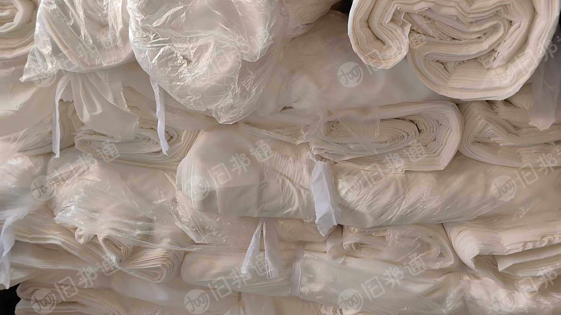 长期大量出售服装库存布，涤塔夫，舒美绸，色丁布，包装布，胚布